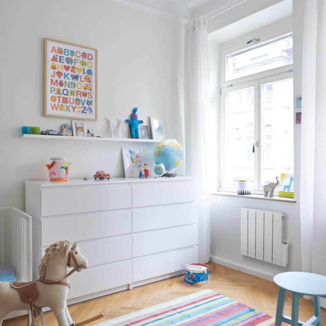 Alura Electric radiator in a room setting